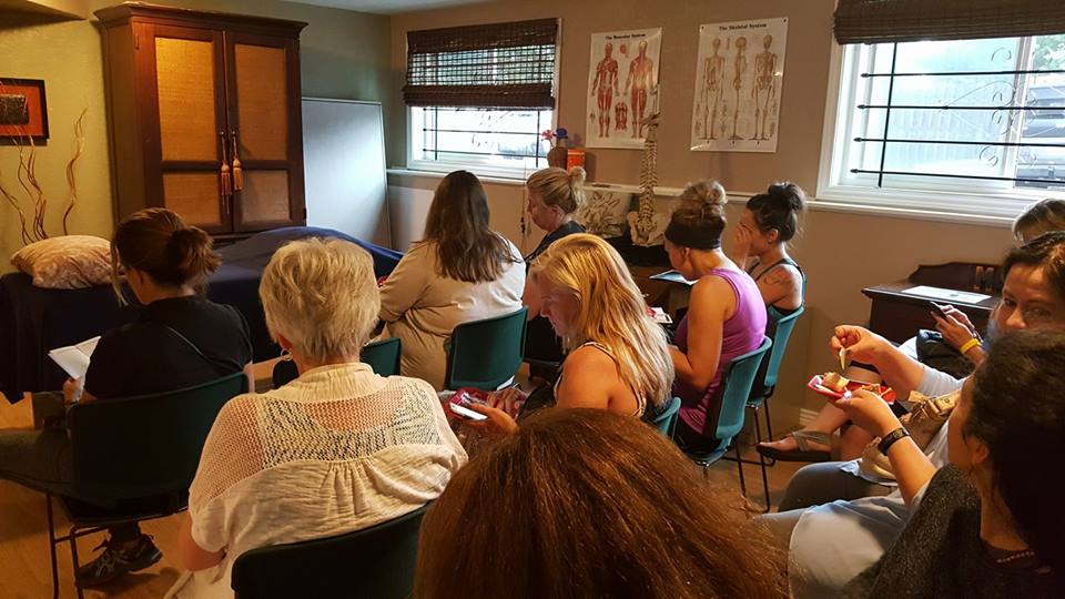 Room Full of Women Seeking Certification at Advanced Therapy Institute of Touch Open House, Colorado Springs